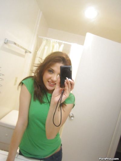 Cute ex-girlfriend Evilyn Fierce showing off small boobs while taking selfie