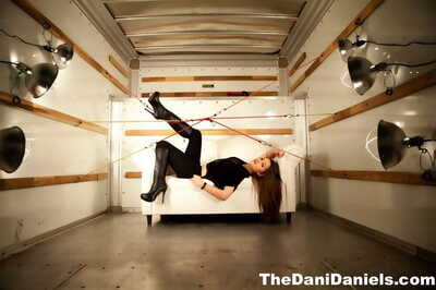 Solo girl Dani Daniels exposes her trimmed muff in back of a Uhaul truck