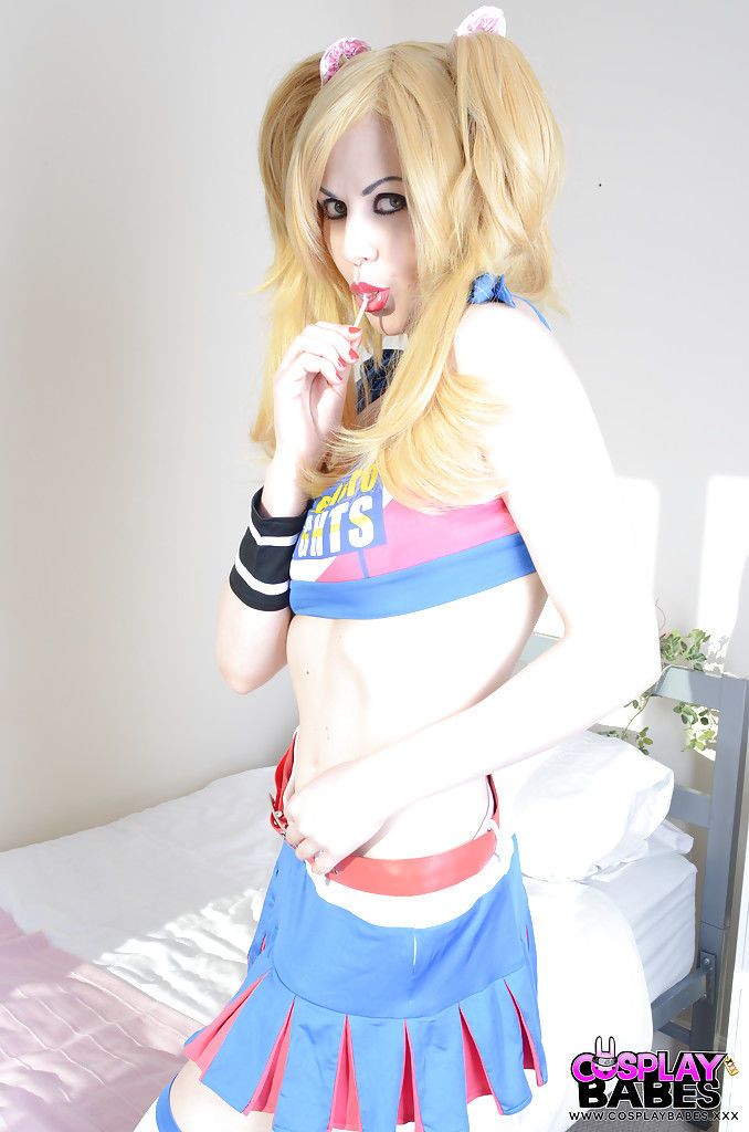 Blonde cosplay cutie Tina Fay masturbating shaved vagina with lollipop