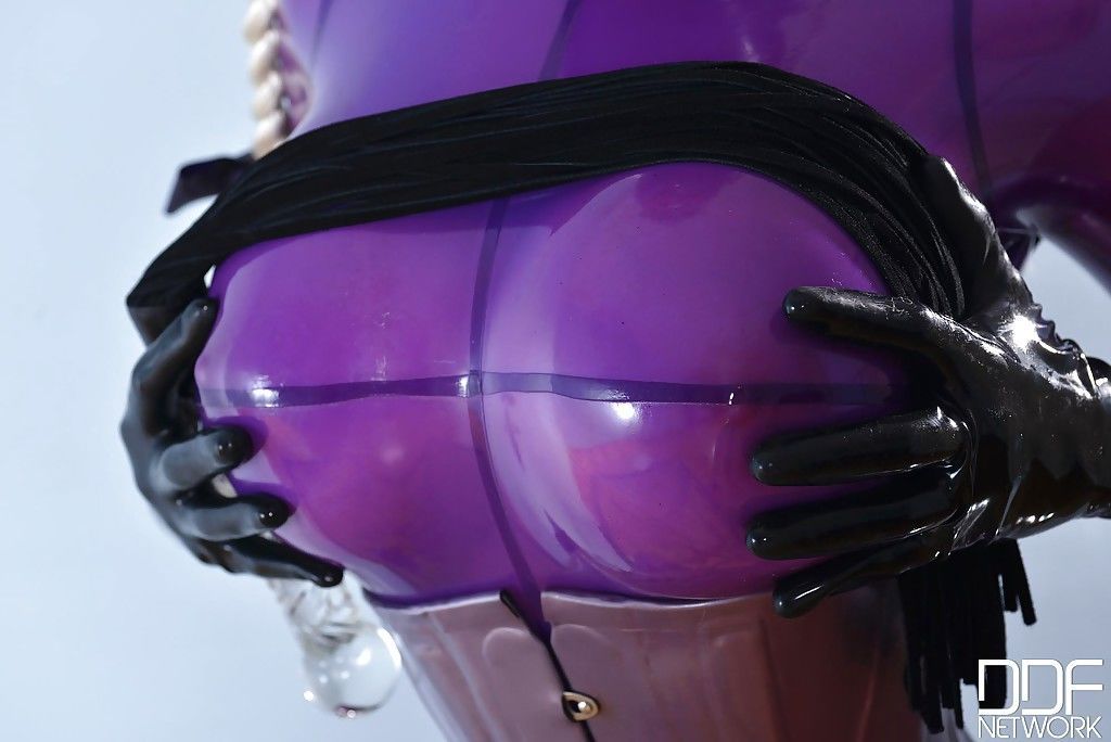 Pretty blonde babe Latex Lucy masturbating that pussy deep with a toy