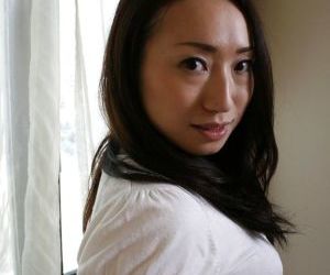 Wonderful brunette asian milf Eriko showing hairy pussy